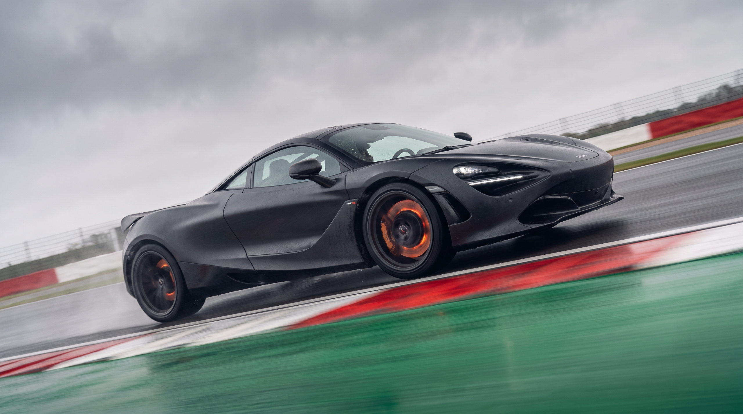 Glowing brake discs mid-corner, the thermal limit that slows electric supercars over a lap