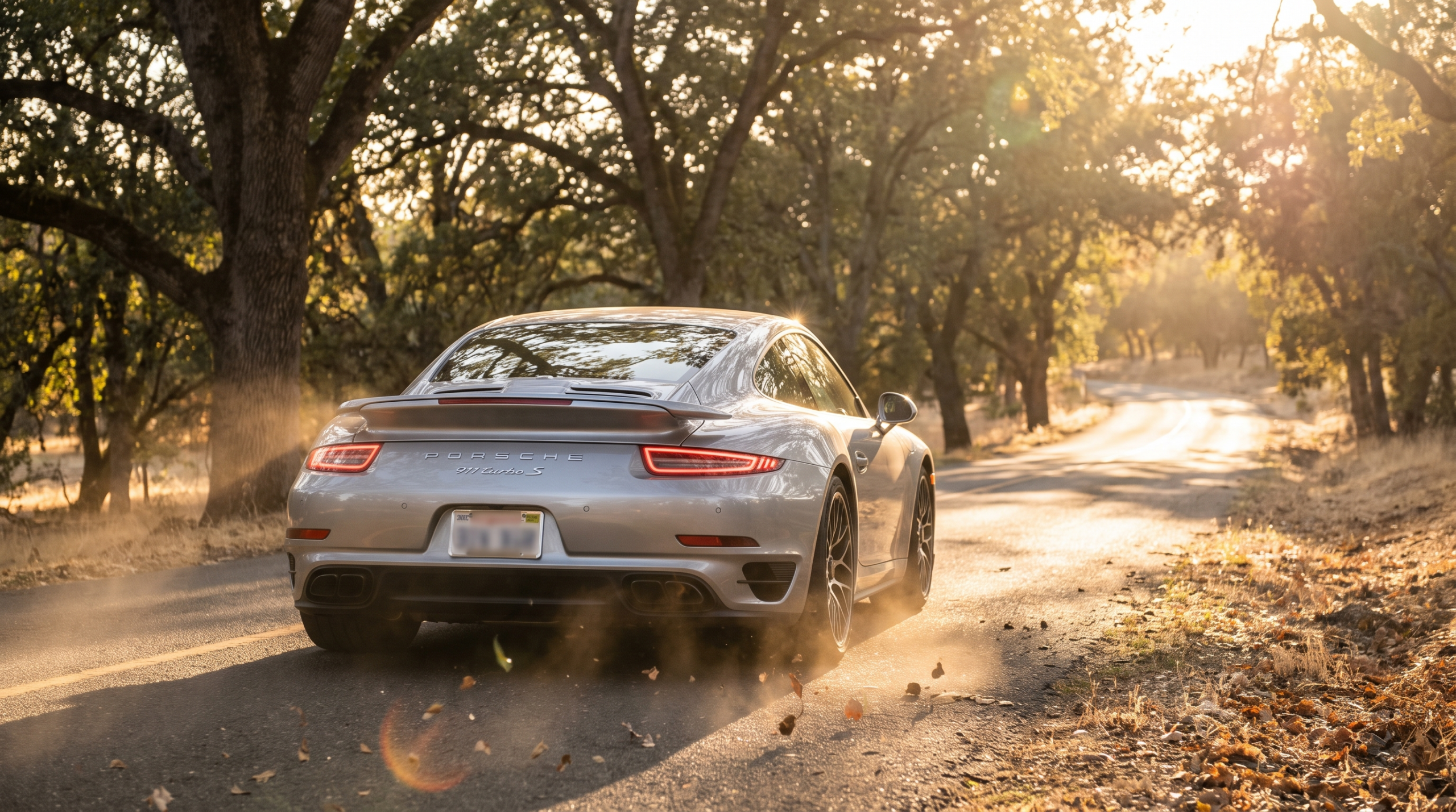 Porsche 911 driving away — Porsche exits Bugatti Rimac to refocus on its core business (illustrative)