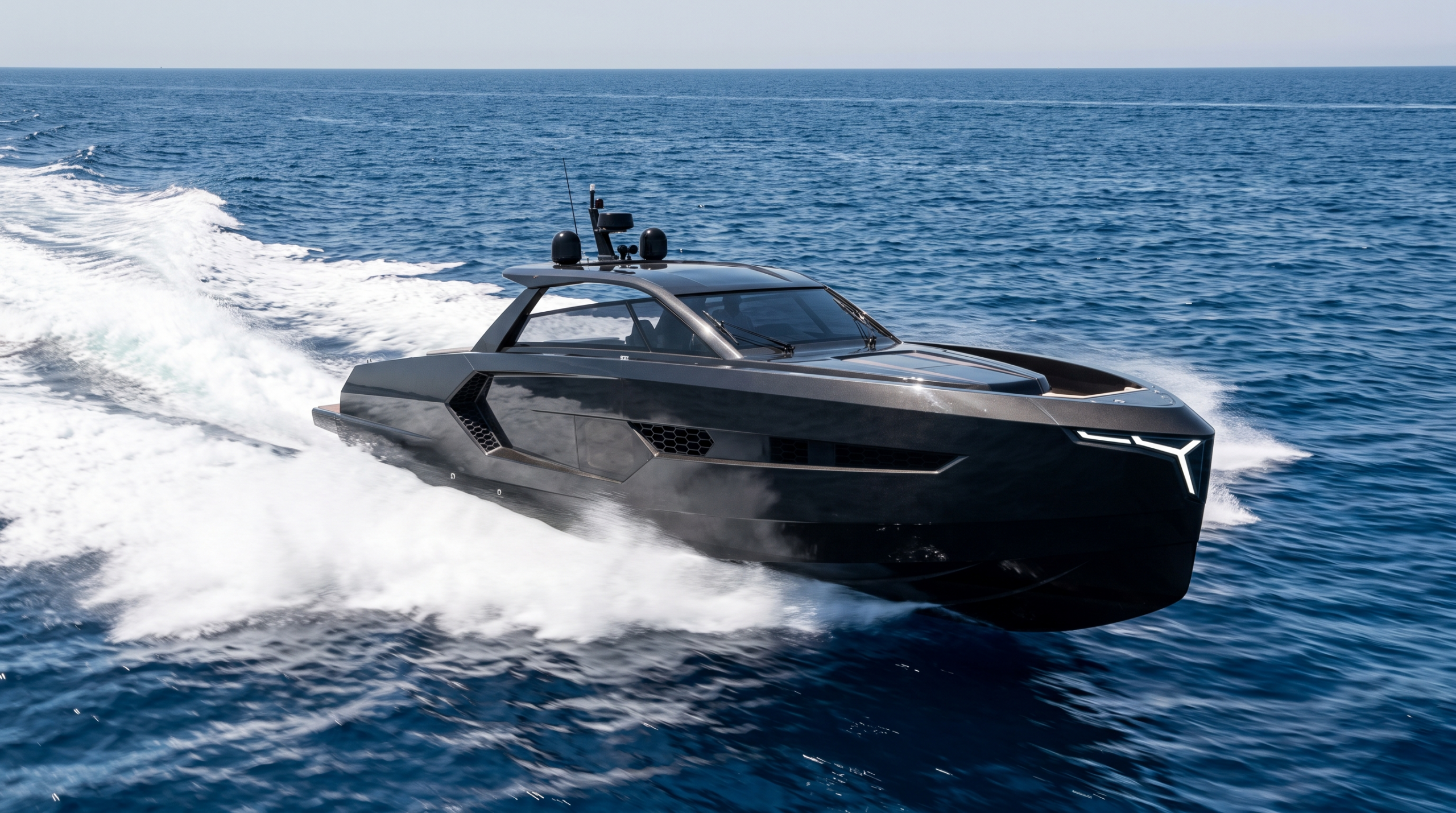 Supercar boats in action: a carbon-fiber Italian sports yacht with angular hypercar styling running at speed
