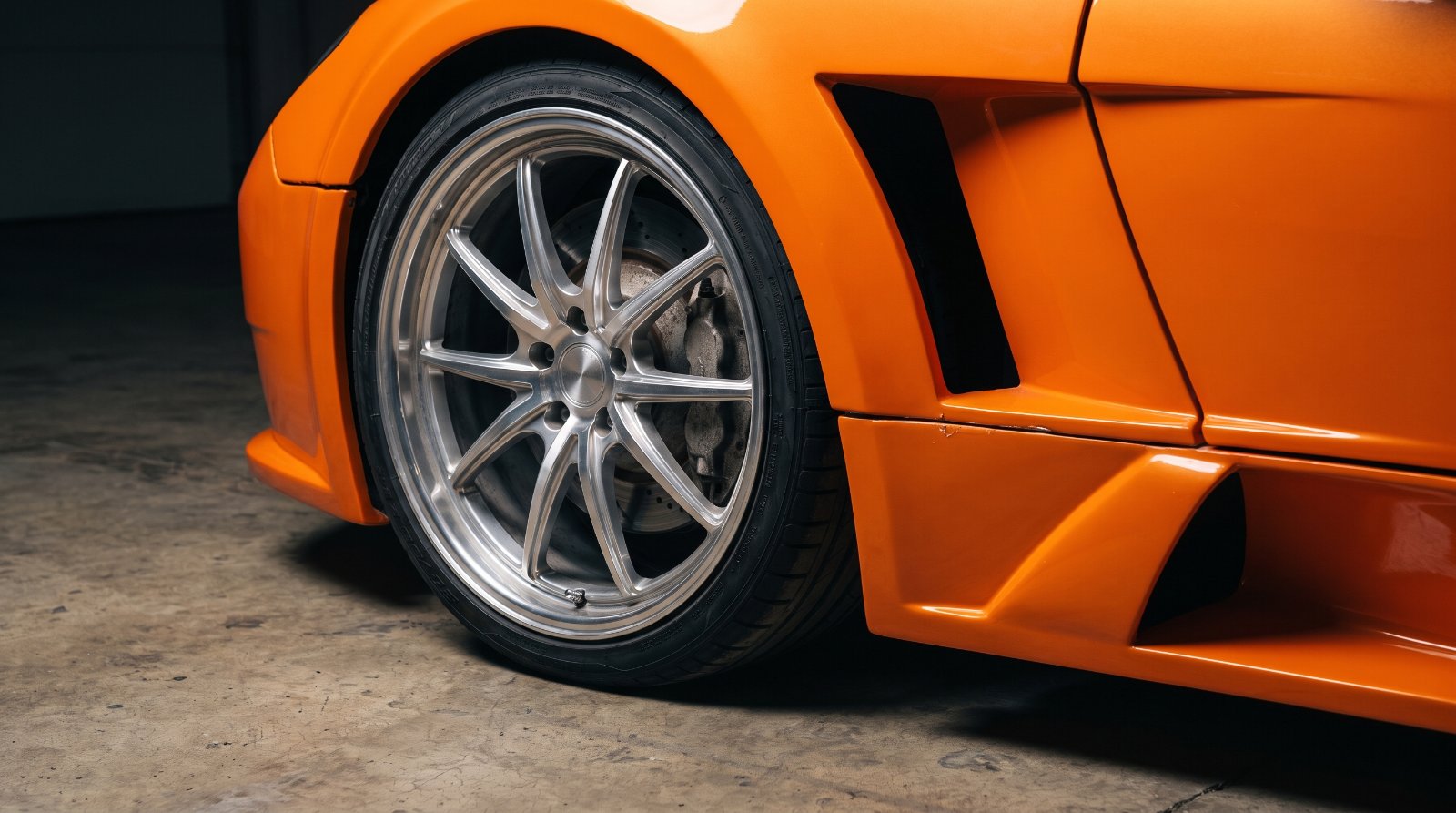 Illustration of the alloy wheel and composite bodywork of the Aurelio, the first Filipino supercar