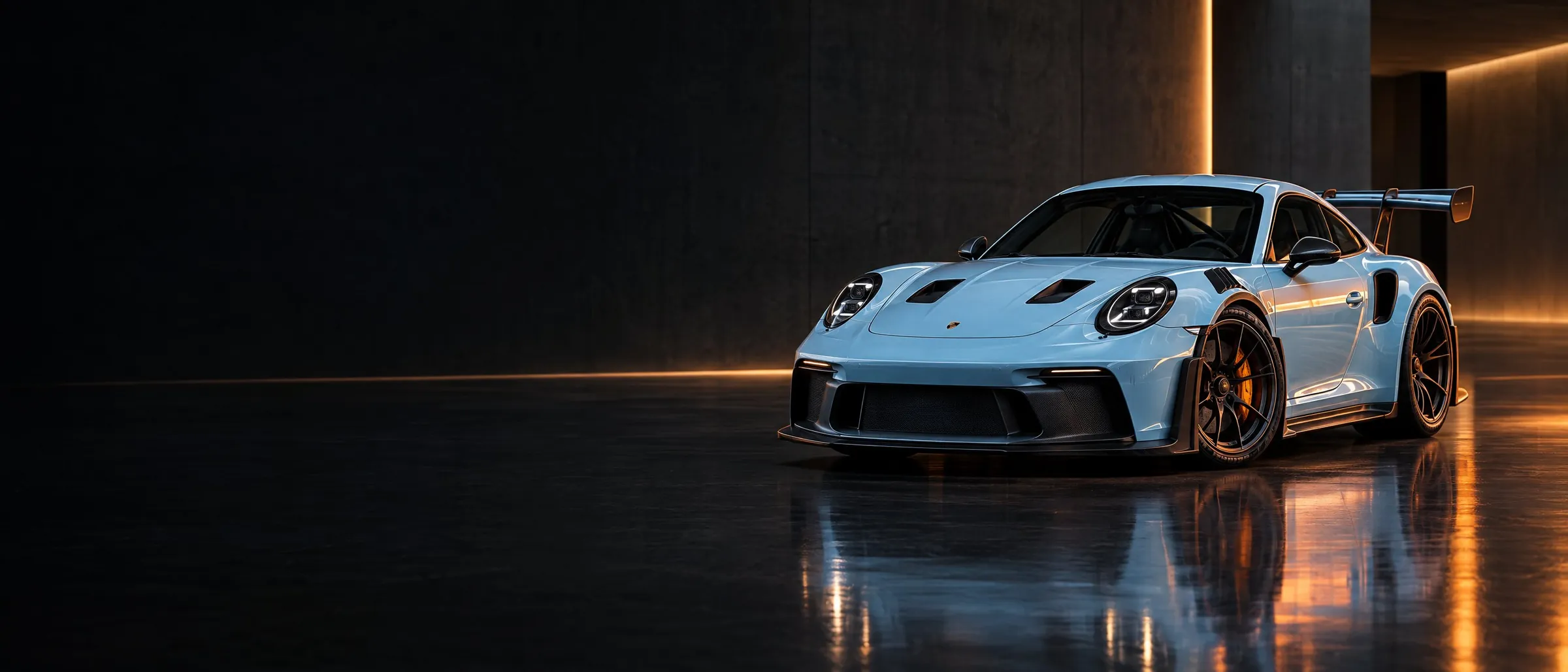 Gulf Blue Porsche 911 GT3 RS in a dark concrete gallery